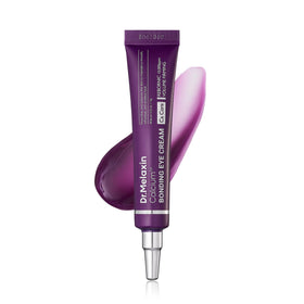 Dr.Melaxin front packaging showing compact eye cream, highlights travel-friendly benefit