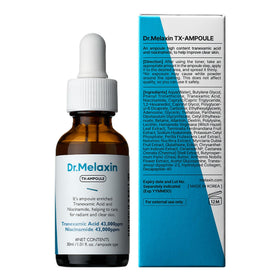 Dr.Melaxin ampoule on vanity with plants suggesting clean-beauty lifestyle