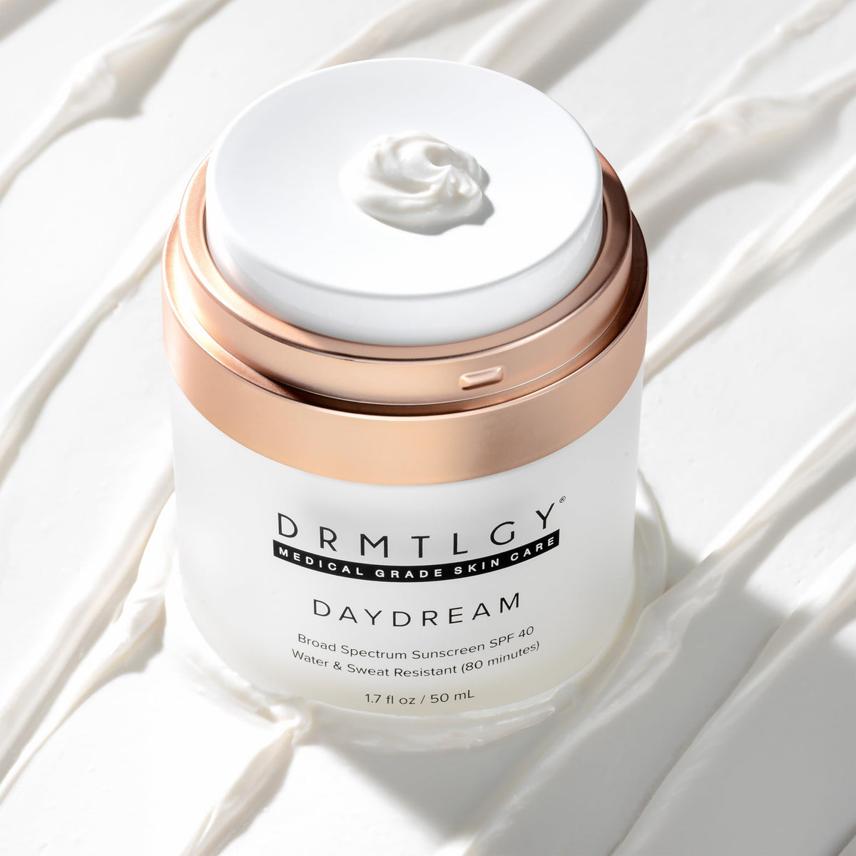 DRMTLGY label close-up highlighting mineral zinc oxide and hydrating ingredients