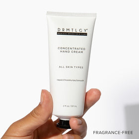 DRMTLGY hand cream application on hands showing gentle massage, helps hydrate and relieve dryness