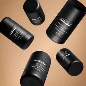 DRMTLGY applying stick to face, quick invisible reapplication benefit