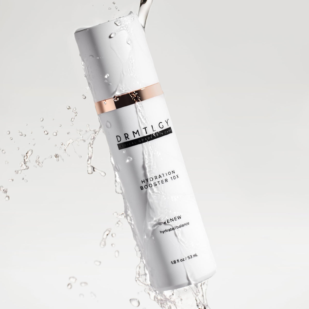 DRMTLGY dropper dispensing serum highlighting precise application