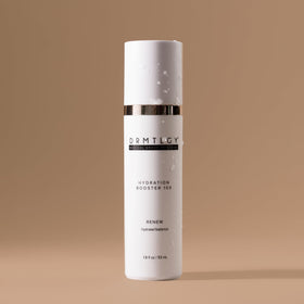 DRMTLGY bottle held in hand showing size and travel-friendly benefit