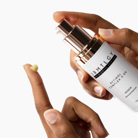 DRMTLGY ingredient label close-up listing retinol, vitamin C, and vitamin E benefits