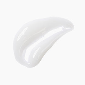 DRMTLGY bottle staged in nighttime routine to suggest easy evening use