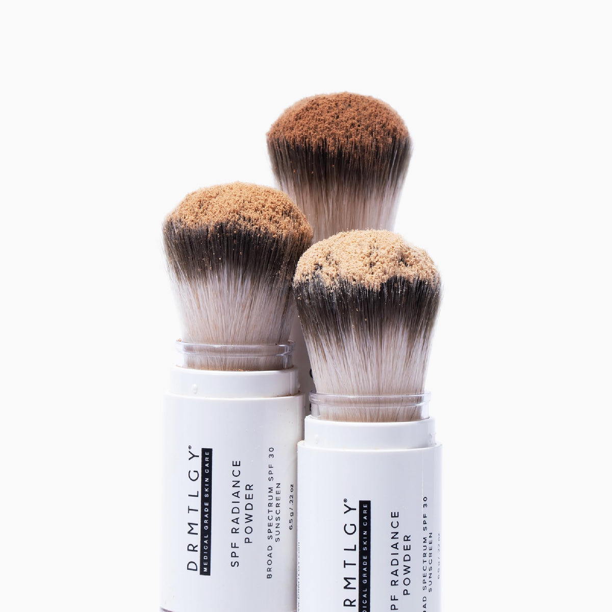 DRMTLGY open brush applicator demonstrating clean, easy reapplication benefit