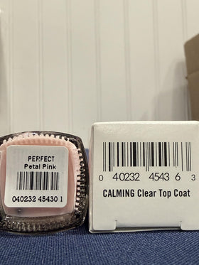 Dr.'s Remedy hands holding bottle in lifestyle setting showing healthy nails