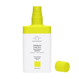 Drunk Elephant spray mist close-up showing superfine distribution for even coverage