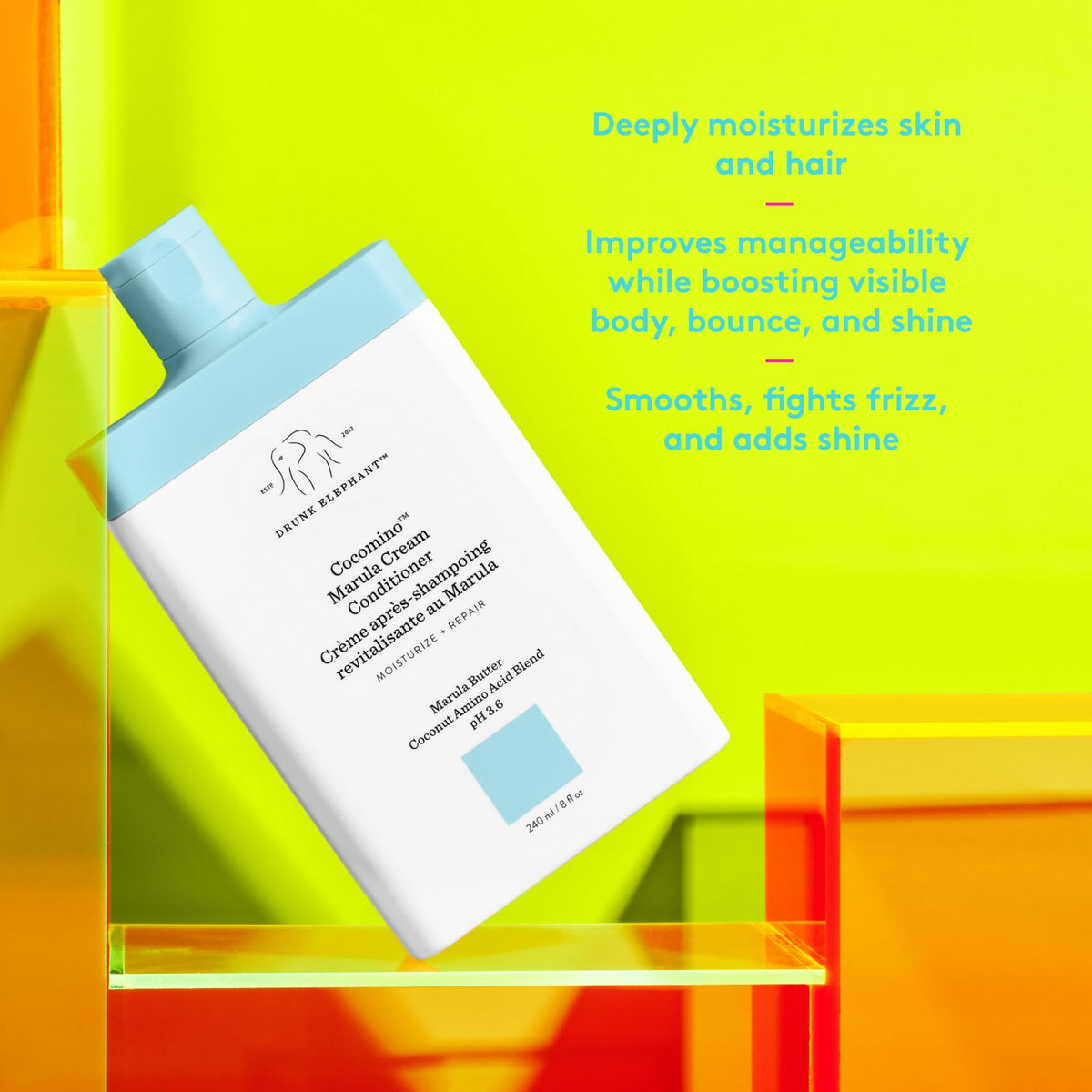 Drunk Elephant dispensing conditioner from pump demonstrating easy application and control