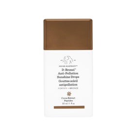 Drunk Elephant front packaging bottle showing bronzing serum and clean design for effortless glow