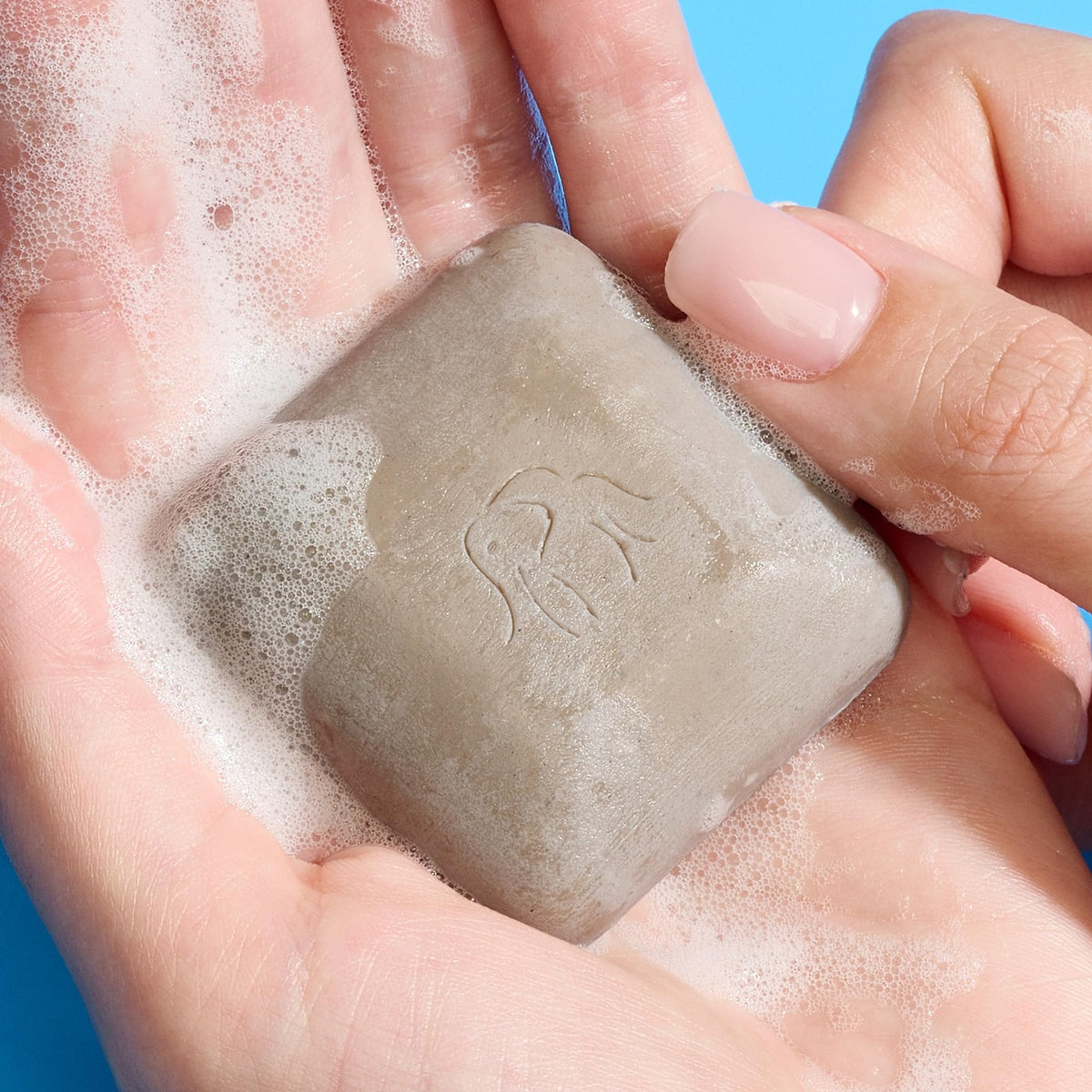 Drunk Elephant Juju Bar close-up of clay texture highlighting gentle exfoliation benefits