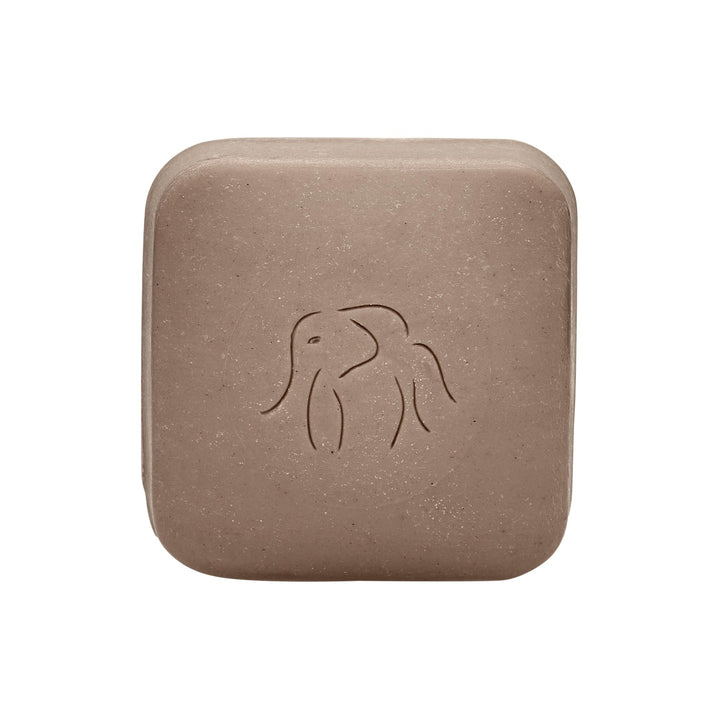 Drunk Elephant Juju Bar front packaging showing branding and weight, clarifies contents