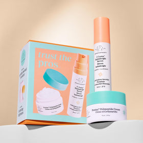 Drunk Elephant kit staged on bathroom shelf suggesting daily routine