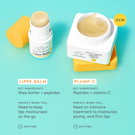 Drunk Elephant on a nightstand near pillow suggesting nightly restorative lip care routine