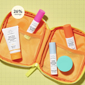 drunk elephant open kit layout with five minis displayed, convenient travel routine visual