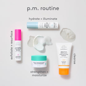 drunk elephant The Littles in a travel pouch on a suitcase representing easy on-the-go skincare