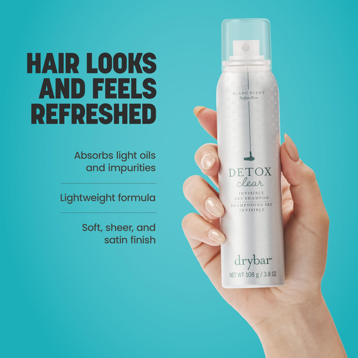 Texture close-up of spray mist illustrating Drybar formula’s fine, invisible powder