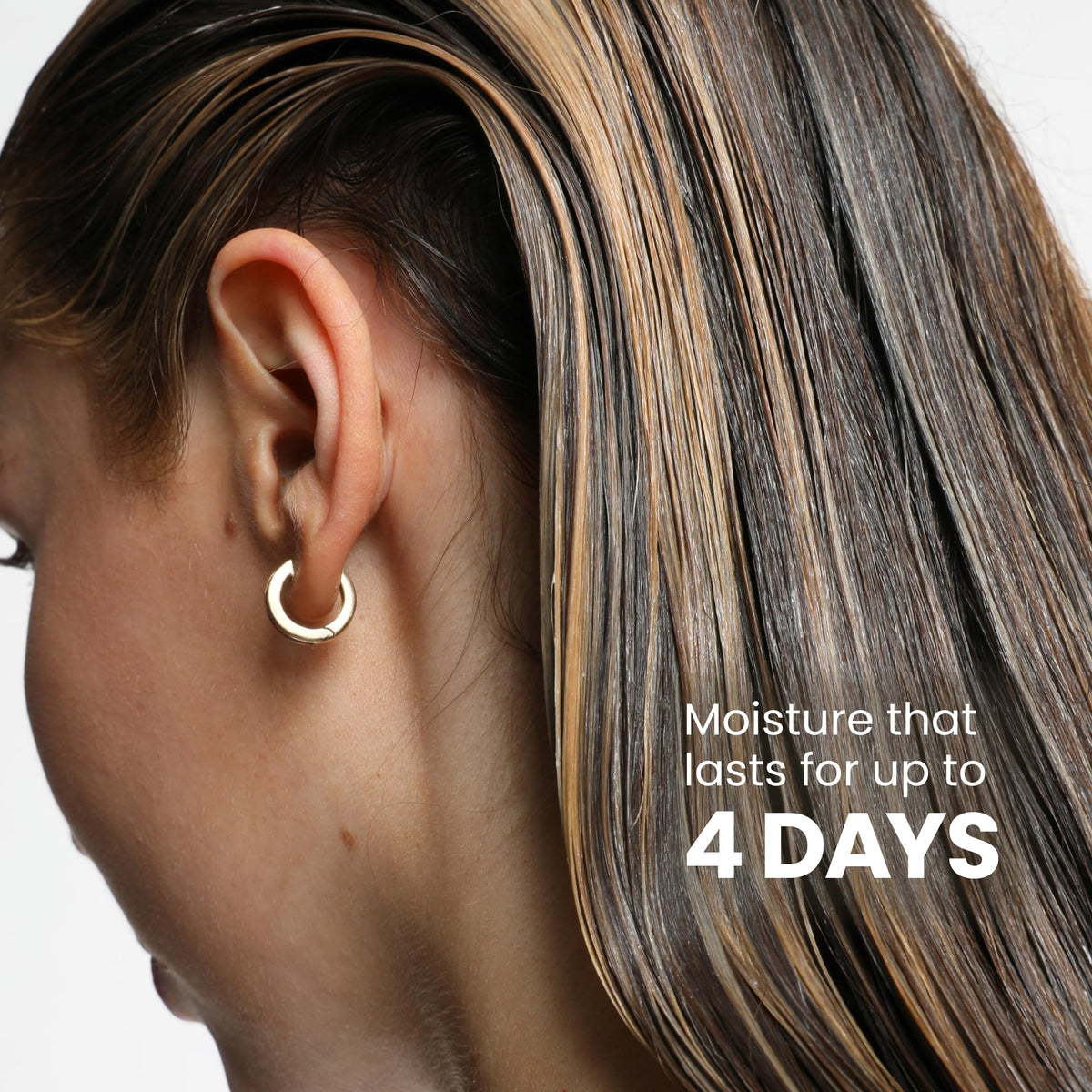 Drybar mask applied to wet hair, visible coverage restoring moisture