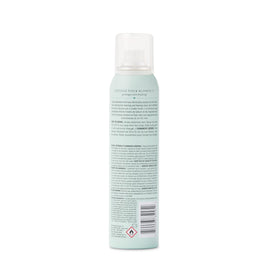 Drybar Detox tucked into a travel bag illustrating on-the-go refresh and convenience