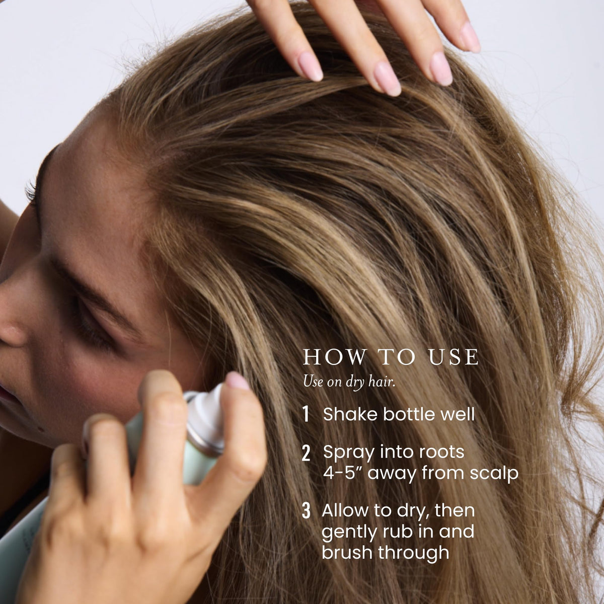Person spraying Drybar Detox at roots to refresh hair and boost lift instantly