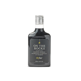 Drybar front packaging showing bottle and branding, clean shelf benefit