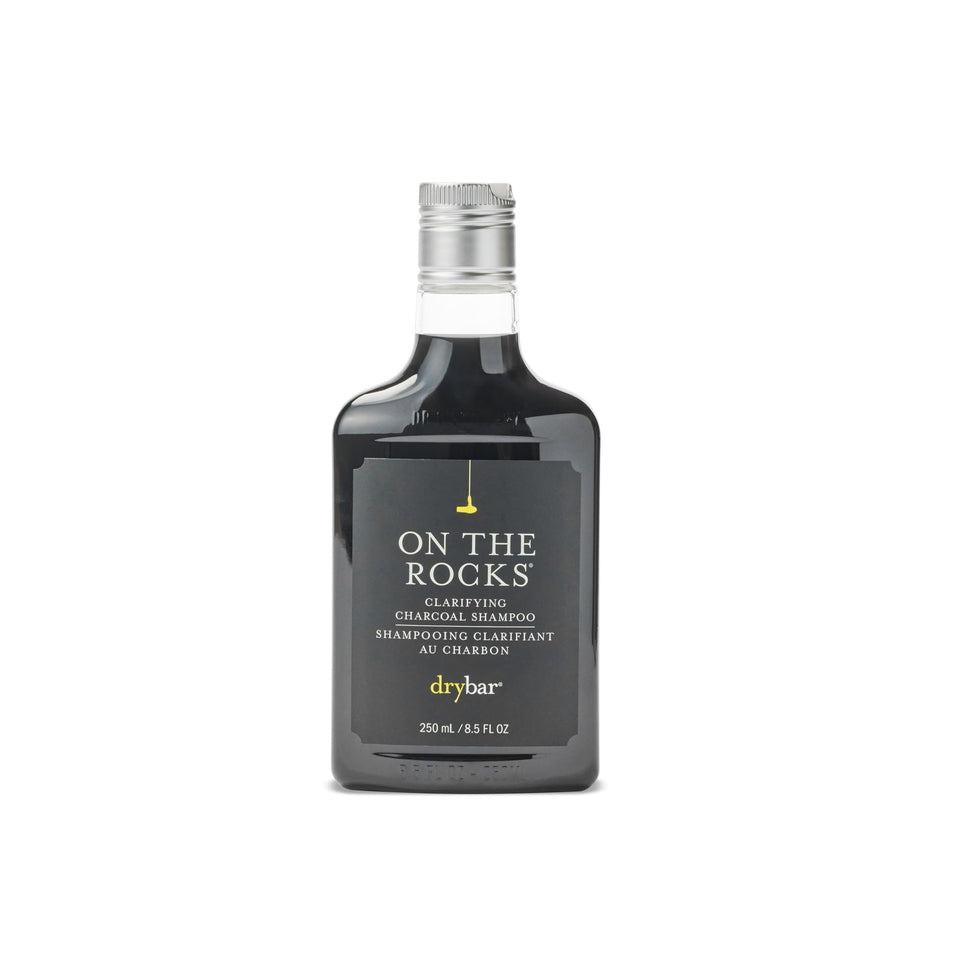 Drybar front packaging showing bottle and branding, clean shelf benefit