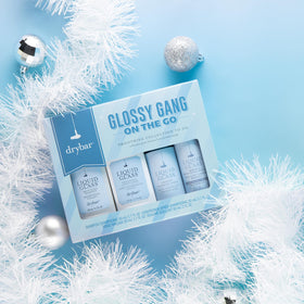 Drybar Instant Glossing Rinse being squeezed for quick high-shine benefits