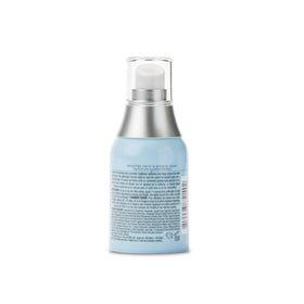 Drybar Liquid Glass packed in a beauty bag illustrating travel-friendly shine