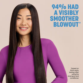 Drybar conditioner applied on wet hair in hand for easy mid-length application