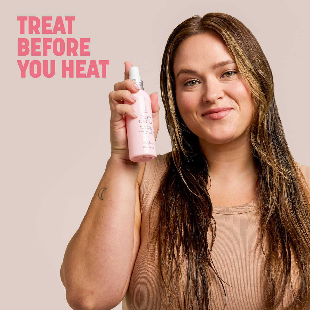 Drybar next to passport to emphasize travel-friendly heat protectant