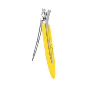 Drybar Tiny Tamers in use sectioning hair showing secure hold while styling