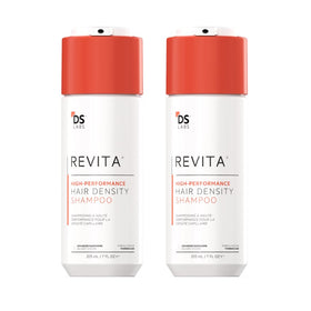 DS Laboratories front view of two Revita Shampoo bottles showing packaging and product size benefit