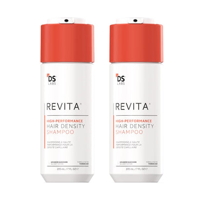 DS Laboratories front view of two Revita Shampoo bottles showing packaging and product size benefit