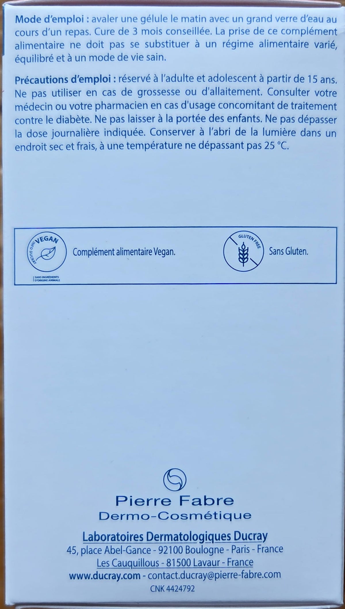 Ducray capsule closeup revealing texture and size for easy swallowing benefit