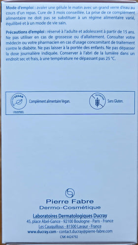 Ducray capsule closeup revealing texture and size for easy swallowing benefit