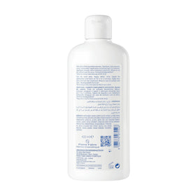 Ducray Anaphase+ creamy lather dispensed, showing texture and easy application