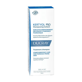 Ducray shampoo being massaged into scalp to loosen scales and flakes