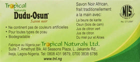Dudu-Osun next to ruler showing bar size for scale and convenience