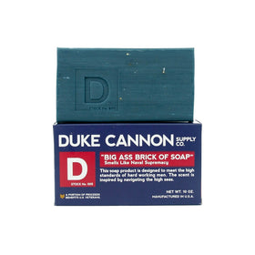 Duke Cannon bar close-up of steel-cut grain texture for secure grip and steady lather