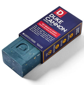 Duke Cannon bar creating rich lather in shower, effective cleansing benefit