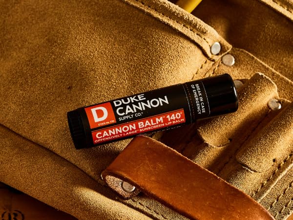 Duke Cannon blood orange mint balm in outdoor setting for durable protection