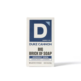 Duke Cannon High Country bar with lather demonstrating rich cleansing performance