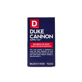 Duke Cannon bar displayed on bathroom shelf in lifestyle scene, rugged aesthetic benefit