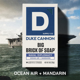Duke Cannon Naval Diplomacy foaming lather in hand showing rich suds and deep clean