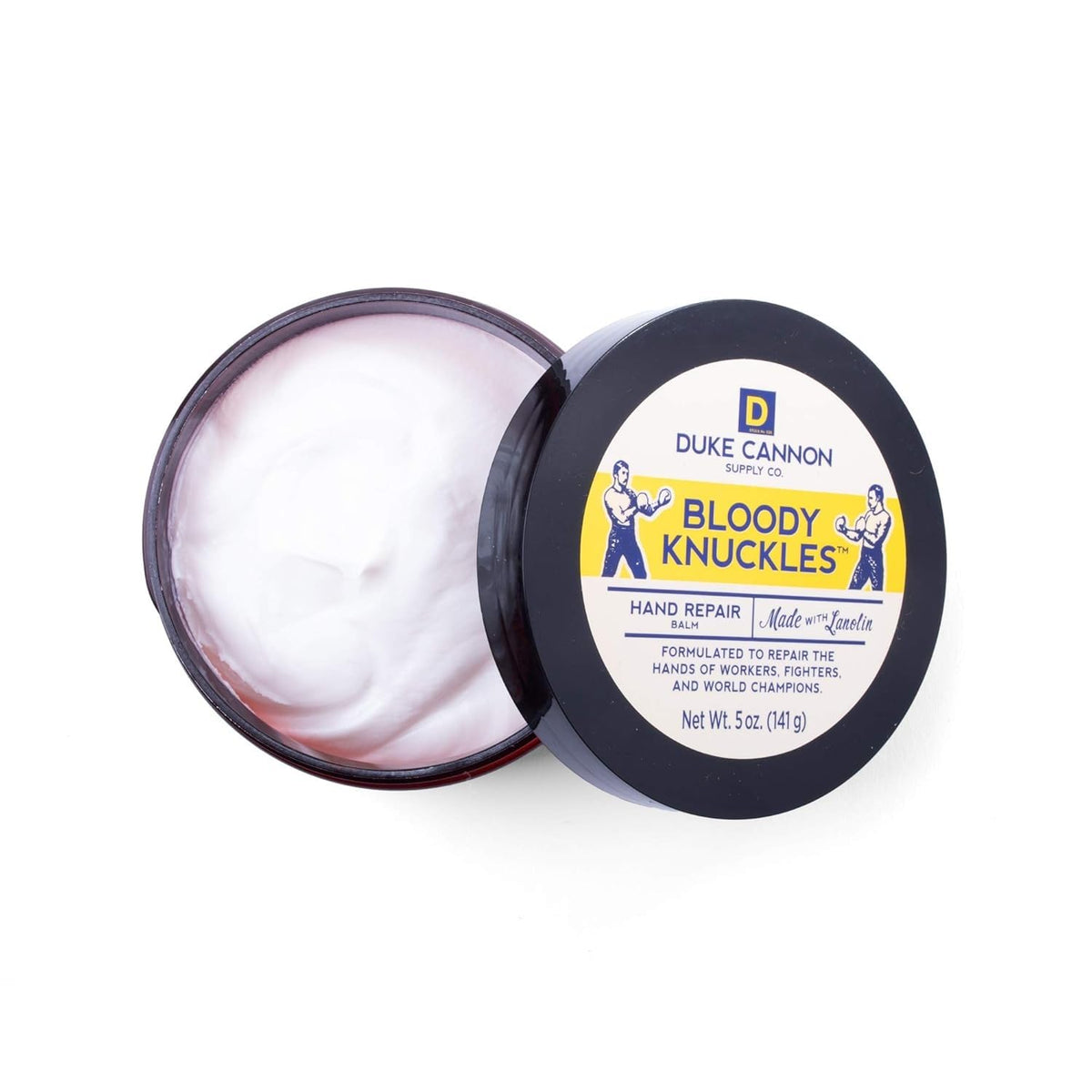 Duke Cannon open tin revealing thick lanolin texture for deep hydration