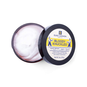 Duke Cannon open tin revealing thick lanolin texture for deep hydration