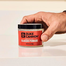 Duke Cannon pomade texture in jar highlighting easy-to-work consistency