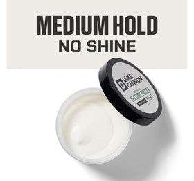 Duke Cannon close-up of putty texture highlighting matte, moldable formula for easy shaping
