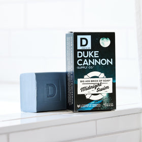 Duke Cannon in-shower lifestyle scene conveying refreshing scent and daily revitalizing benefit