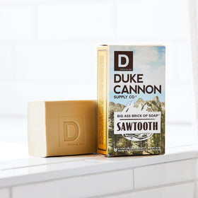 Duke Cannon bar beside common soap for size comparison benefit